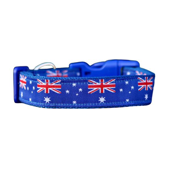 Dog collar featuring blue ribbon adorned with Australian Flags. The collar is on blue webbing and has a blue buckle.