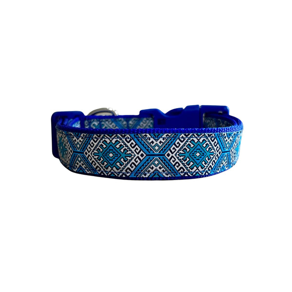 Dog collar featuring Aztec themed ribbon on royal blue webbing.