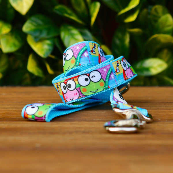 Dog leash featuring a blue ribbon with Keroppi frog theme, on blue webbing. 
